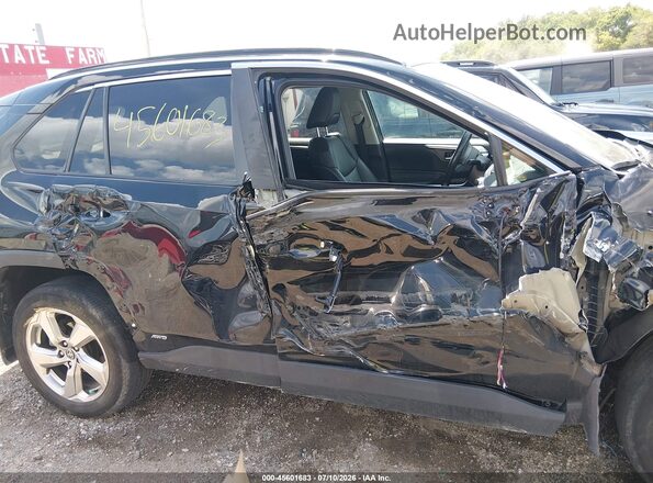 2T3B6RFV8MW023560 2021 TOYOTA RAV4 HYBRID Black Սալոնի հետևի տեսք