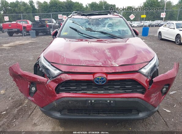 2T3B6RFV9RW057658 2024 TOYOTA RAV4 HYBRID Red Widok z przodu