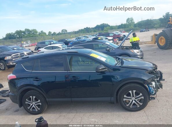 2T3BFREV0JW757655 2018 TOYOTA RAV4 Черный Вид задней части салона
