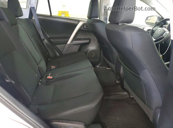 2T3BFREV1GW513005 2016 TOYOTA RAV4 Silver Rear interior view