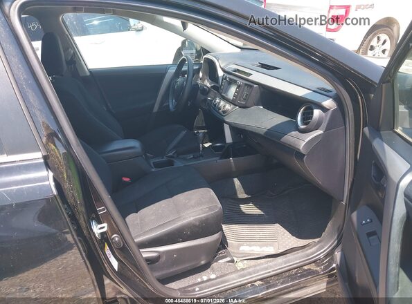 2T3BFREV1HW637812 2017 TOYOTA RAV4 Black წინა სალონის ხედი
