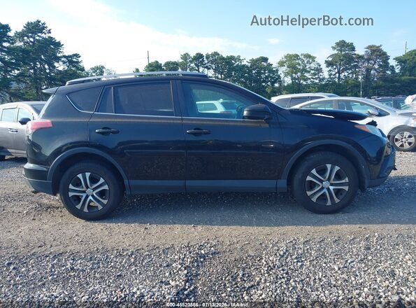 2T3BFREV1JW831584 2018 TOYOTA RAV4 Black Вид задньої частини салону
