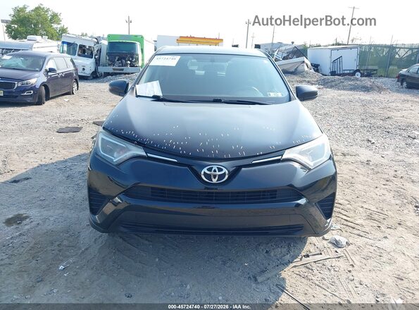 2T3BFREV2GW504815 2016 TOYOTA RAV4 Черный Вид задней части салона