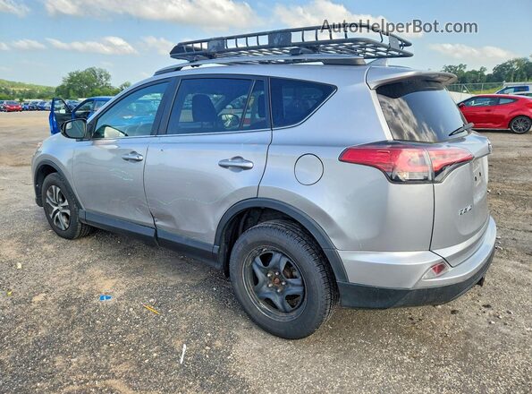 2T3BFREV2HW585123 2017 TOYOTA RAV4 Серебряный Задняя левая четверть