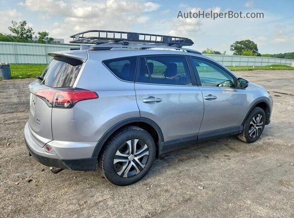 2T3BFREV2HW585123 2017 TOYOTA RAV4 Серебряный Задняя правая четверть