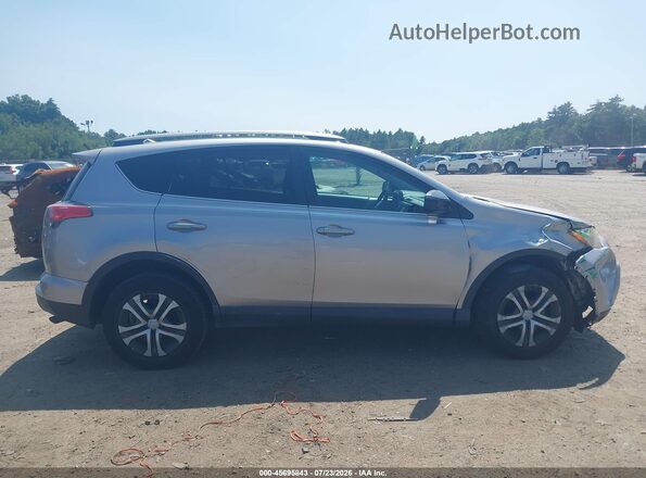 2T3BFREV2HW590581 2017 TOYOTA RAV4 Silver Սալոնի հետևի տեսք