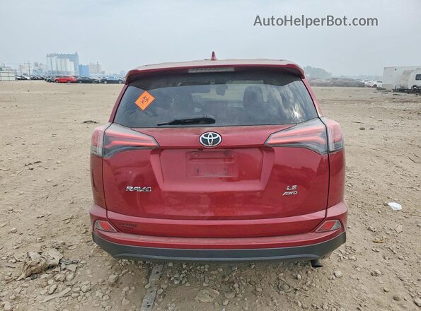 2T3BFREV2JW719523 2018 TOYOTA RAV4 Red Rear view