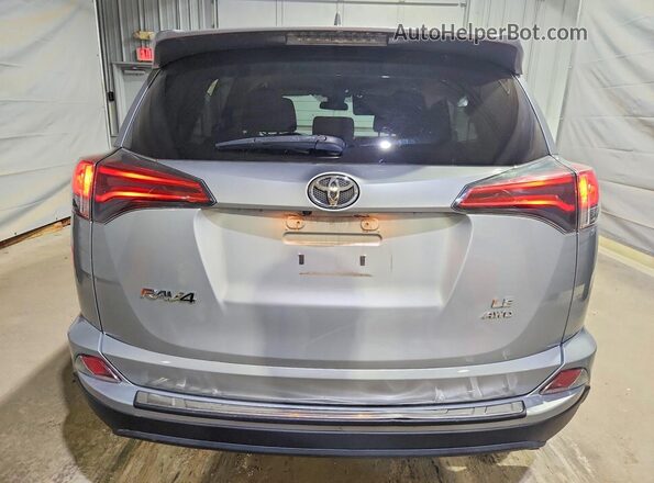 2T3BFREV3JW849648 2018 TOYOTA RAV4 Silver უკანა ხედი