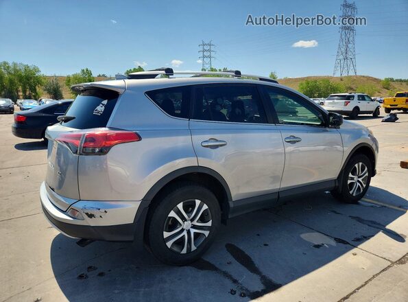 2T3BFREV4GW506274 2016 TOYOTA RAV4 Silver Задня права чверть