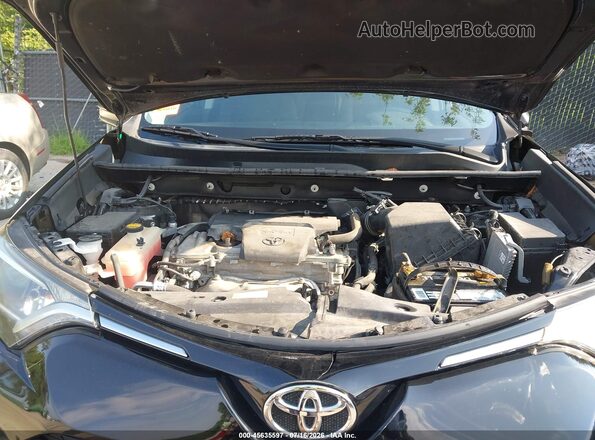 2T3BFREV4GW512883 2016 TOYOTA RAV4 Black Հետևի տեսք