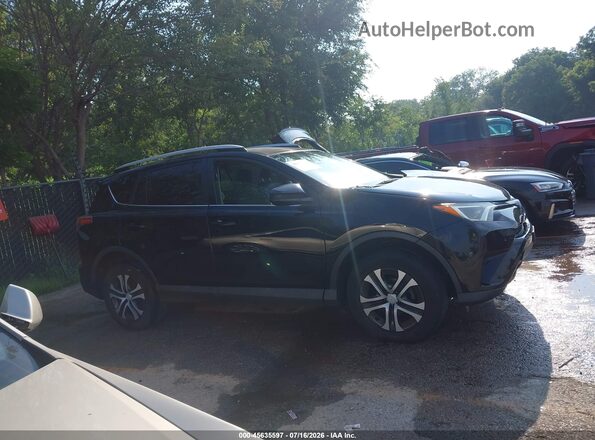2T3BFREV4GW512883 2016 TOYOTA RAV4 Black Սալոնի հետևի տեսք