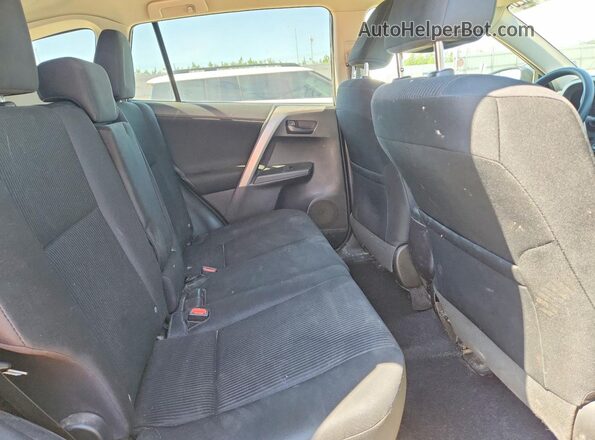 2T3BFREV4HW595992 2017 TOYOTA RAV4 Черный Вид задней части салона