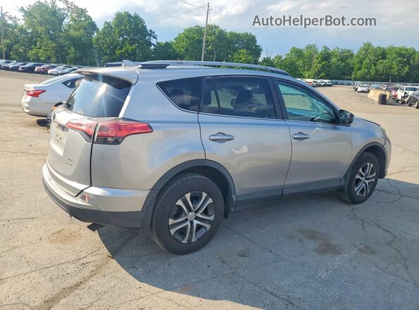 2T3BFREV4HW613035 2017 TOYOTA RAV4 Silver Trasero derecho