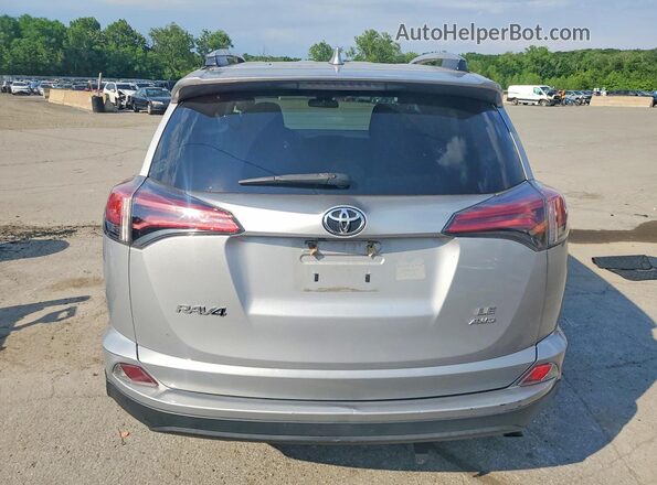 2T3BFREV4HW613035 2017 TOYOTA RAV4 Silver Vista trasera