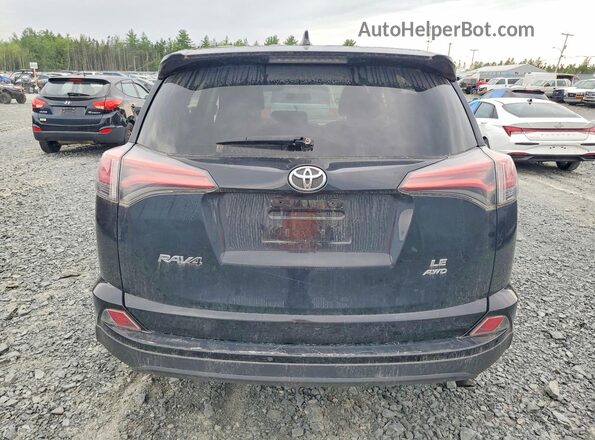 2T3BFREV6GW445154 2016 TOYOTA RAV4 Black Rear view