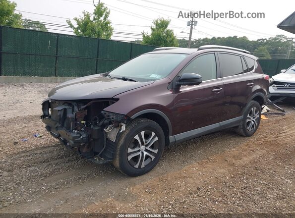 2T3BFREV6GW519818 2016 TOYOTA RAV4 Burgundy Vista tres cuartos delantera izquierda