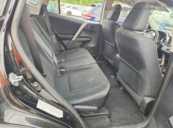 2T3BFREV6HW632296 2017 TOYOTA RAV4 Black Widok wnętrza z tyłu