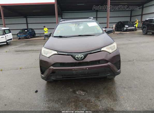 2T3BFREV6JW848932 2018 TOYOTA RAV4 Фиолетовый Вид задней части салона