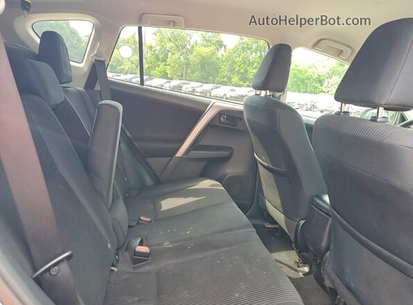 2T3BFREV7GW511470 2016 TOYOTA RAV4 Silver Widok wnętrza z tyłu