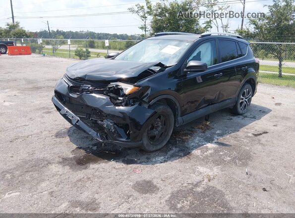 2T3BFREV7GW534506 2016 TOYOTA RAV4 Black Vista tres cuartos delantera izquierda