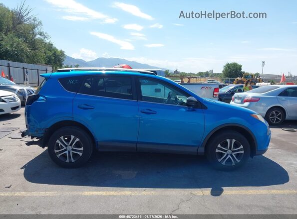 2T3BFREV7HW600652 2017 TOYOTA RAV4 Blue Սալոնի հետևի տեսք