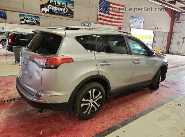 2T3BFREV7HW624255 2017 TOYOTA RAV4 Silver Trasero derecho