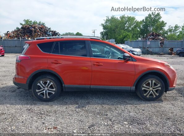 2T3BFREV8GW485302 2016 TOYOTA RAV4 Orange Vista interior trasera