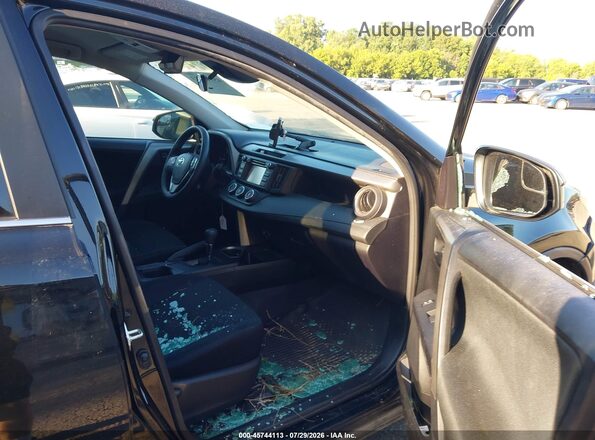 2T3BFREV8HW564874 2017 TOYOTA RAV4 Black Front interior view