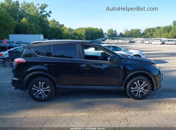 2T3BFREV8HW564874 2017 TOYOTA RAV4 Black Rear interior view