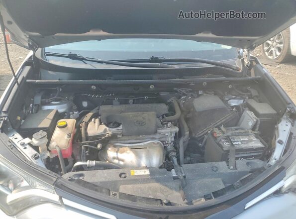 2T3BFREV8HW627164 2017 TOYOTA RAV4 Silver უკანა სალონის ხედი