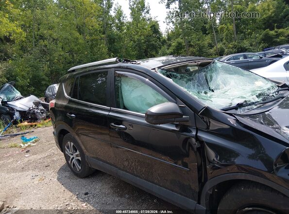 2T3BFREV8HW643560 2017 TOYOTA RAV4 Black Սալոնի հետևի տեսք