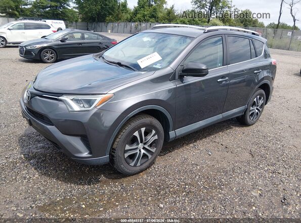 2T3BFREV9GW419020 2016 TOYOTA RAV4 Gray Vista tres cuartos delantera izquierda