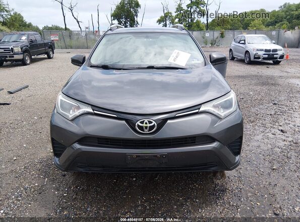 2T3BFREV9GW419020 2016 TOYOTA RAV4 Gray Vista del salpicadero