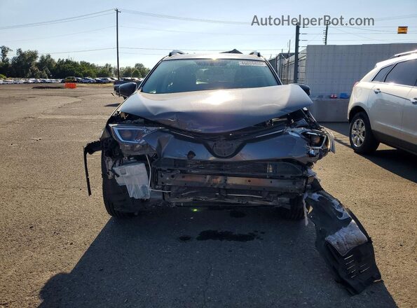 2T3BFREV9GW525855 2016 TOYOTA RAV4 Gray Widok z przodu
