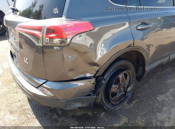2T3BFREVXJW857620 2018 TOYOTA RAV4 Gray Front view
