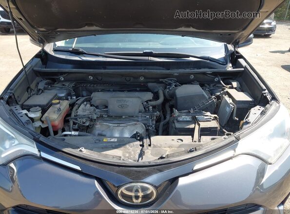 2T3BFREVXJW857620 2018 TOYOTA RAV4 Gray Rear view