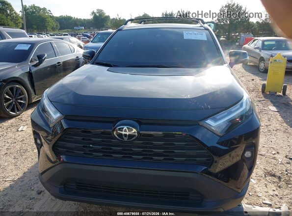 2T3C1RFV0SW372258 2025 TOYOTA RAV4 Black Սարքավորումների վահանակի տեսք