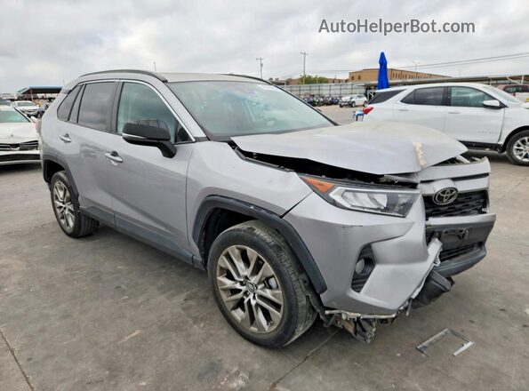 2T3C1RFV1KC027886 2019 TOYOTA RAV4 Серебряный Передняя правая четверть