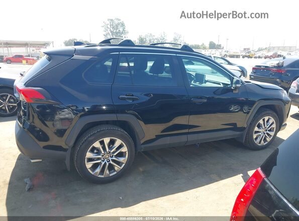 2T3C1RFV2RC258502 2024 TOYOTA RAV4 Черный Вид задней части салона