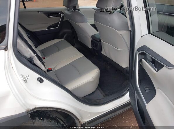 2T3C1RFV4NW205311 2022 TOYOTA RAV4 White Widok naklejki z numerem VIN