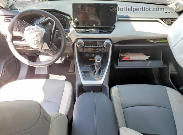 2T3C1RFV9SW431968 2025 TOYOTA RAV4 Серый Вид панели приборов