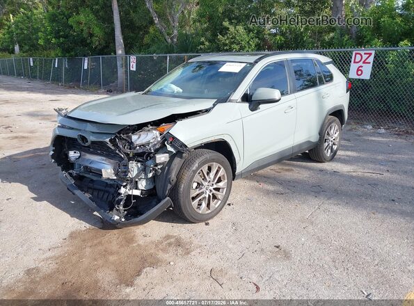 2T3C1RFVXMC087135 2021 TOYOTA RAV4 Зеленый Передняя левая четверть