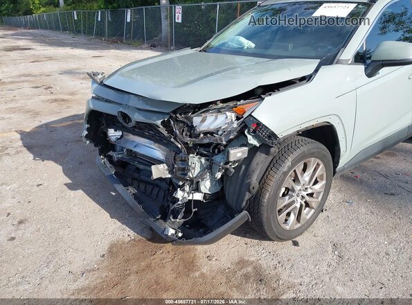 2T3C1RFVXMC087135 2021 TOYOTA RAV4 Зеленый Вид спереди