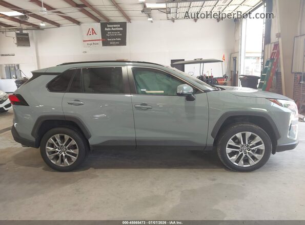 2T3C1RFVXNW237079 2022 TOYOTA RAV4 Серый Вид задней части салона