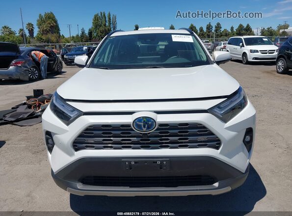 2T3D6RFV0RW073501 2024 TOYOTA RAV4 HYBRID White Rear interior view