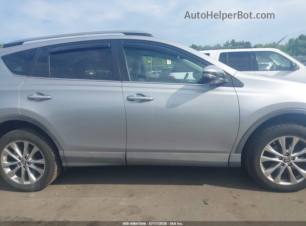 2T3DFREV0JW828796 2018 TOYOTA RAV4 Silver Вид задньої частини салону