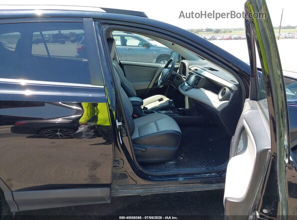 2T3DFREV1JW778622 2018 TOYOTA RAV4 Black Front interior view
