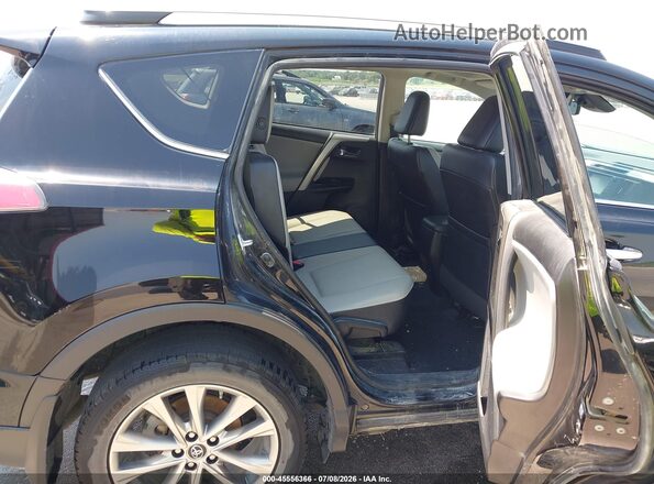 2T3DFREV1JW778622 2018 TOYOTA RAV4 Black VIN sticker view