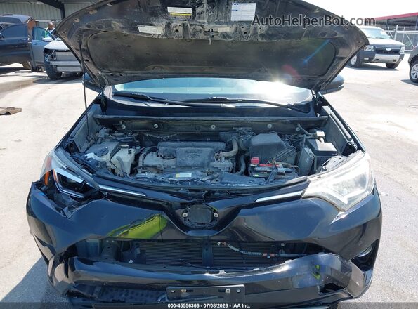 2T3DFREV1JW778622 2018 TOYOTA RAV4 Black Rear view
