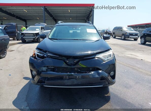 2T3DFREV1JW778622 2018 TOYOTA RAV4 Black Rear interior view